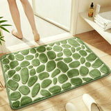 Alfombra de baño de franela con relieve de guijarros