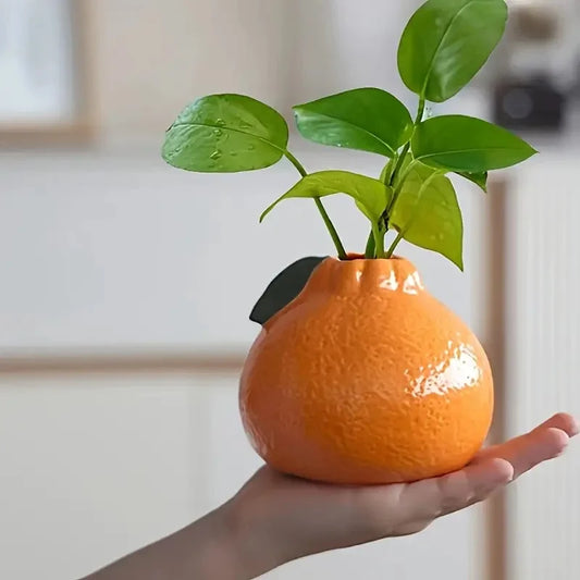 Jarrón de cerámica naranja de diseño