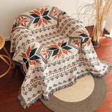 Manta de sofá boho con flecos